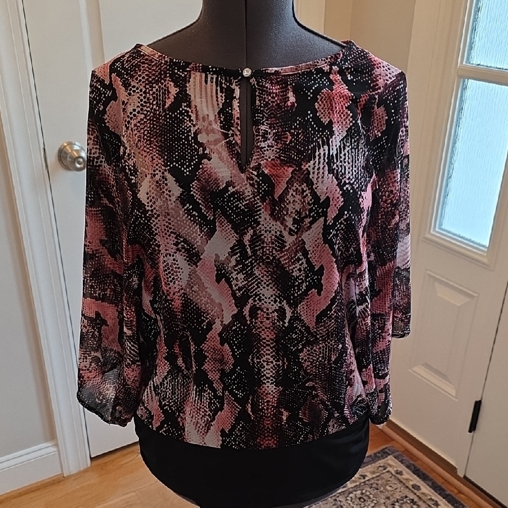 Jennifer Lopez Pink and Black Blouse
